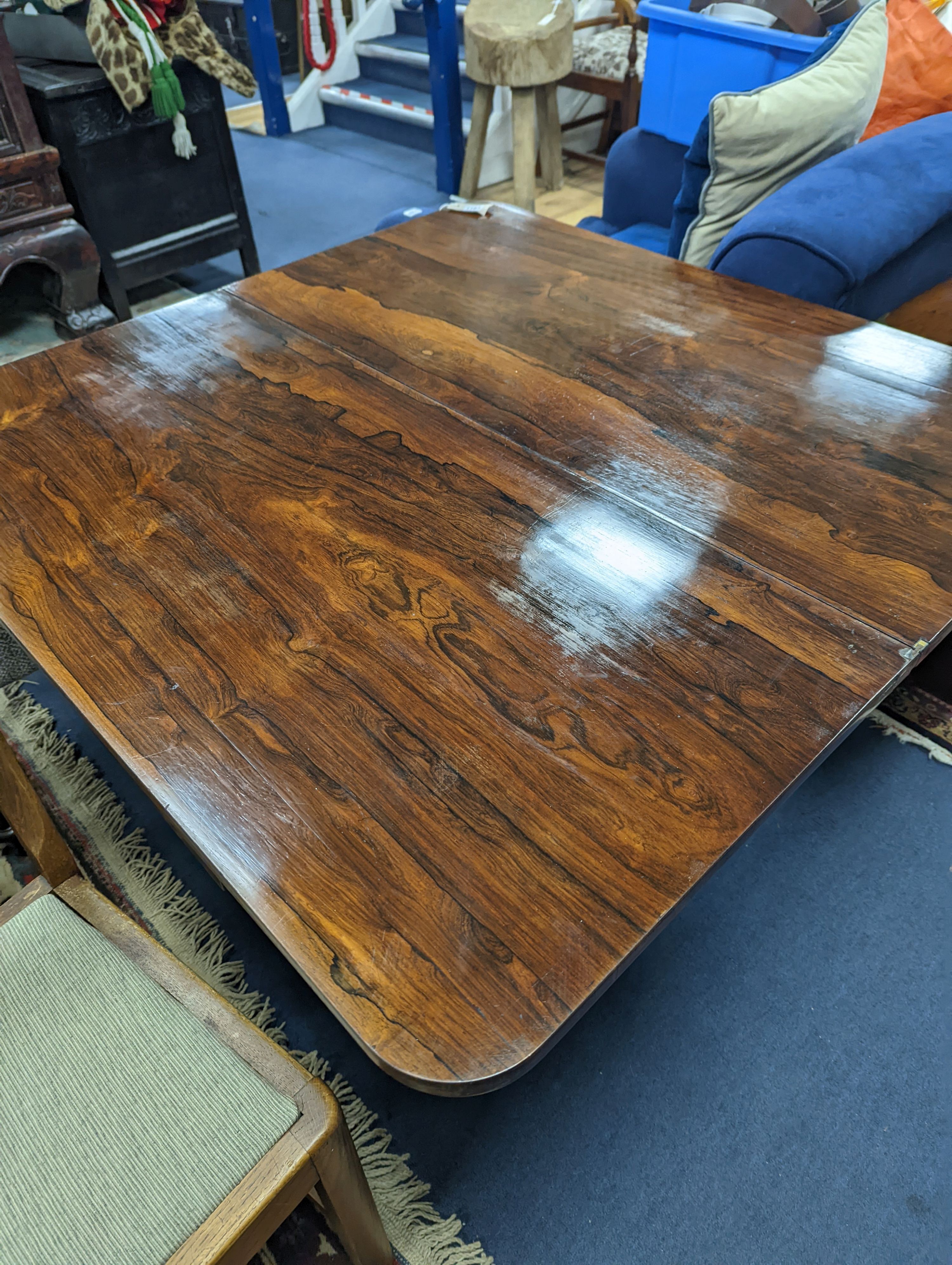 An early Victorian Scottish rosewood rectangular folding tea table, width 106cm, depth 52cm, height 74cm